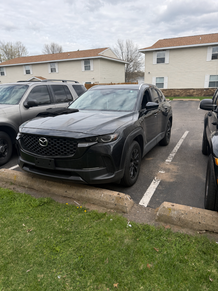Black Mazda CX-50 after an exterior wash